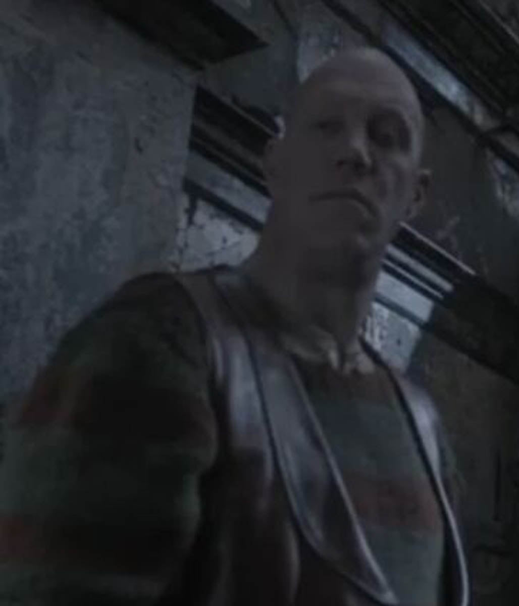 Bald Man with the Long Nose Vest